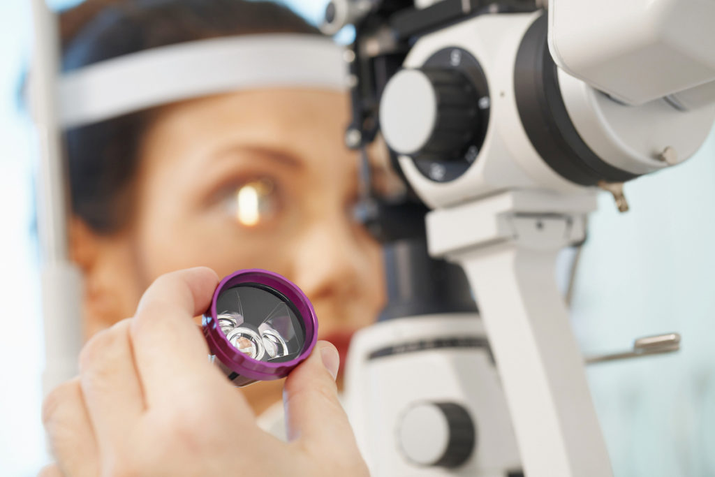 Patient with glaucoma being examined at the slit lamp by Melbourne eye surgeon